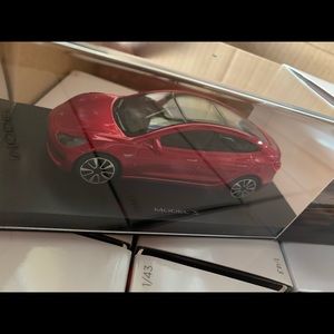 Brand new red Tesla collectable car